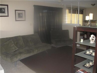 Exterior Front. Den , there is a firepla