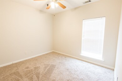 This is the 3rd full bedroom in the home located b