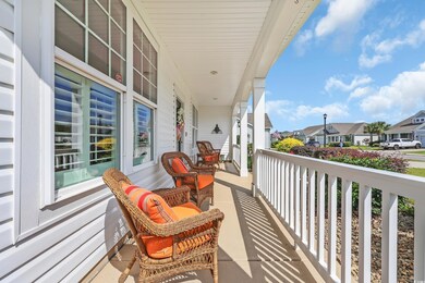 Covered porch with a residential view