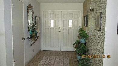 Spacious entry foyer with tiled floor