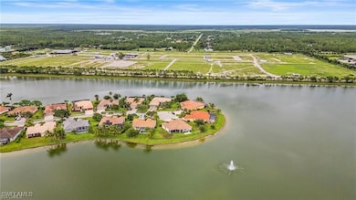 Aerial view of residential area with a nearby body of water
