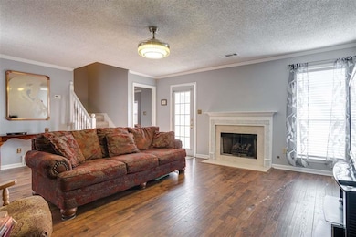 Fireplace has gas logs, beautiful mantle and tile 