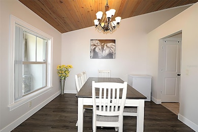 with beautiful wood floors & high ceilings...