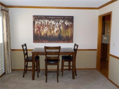 Dining room with plantation shutters right off the