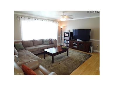 View #1 of the living room, cove molding, chair ra