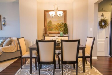 Dining room separates the living room and kitchen/