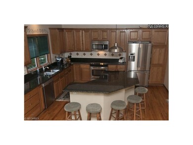 Fabulous kitchen with wood cabinets, new granite, 