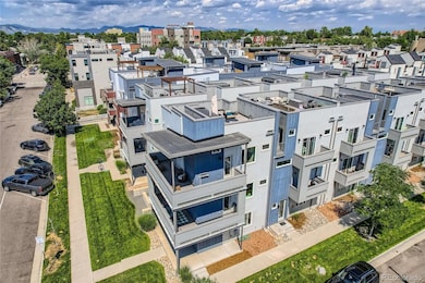 Outdoor living and entertaining at its finest! Two massive wraparound decks, a 450sf roof top deck and entry level covered patio. This corner residence offers south and east views of the city and views to the west of the mountains. You won't want to go inside unless it's time for bed.