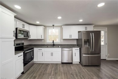 State of the Art Appliances with Custom Shaker Cabinets