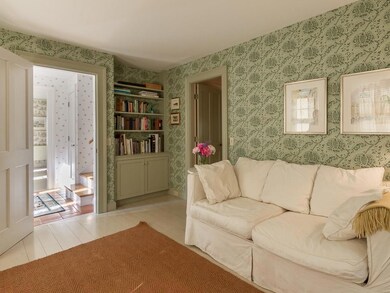 A den with built-in shelves and...