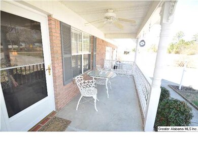 Nice front porch perfect for a few rocking chairs.