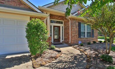 Stone Landscape Rocks line the Sidewalk to the Front Door.