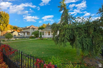 View of yard with a porch