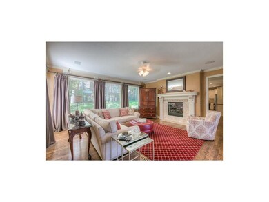 Living Room features 5.1 Home Theater, see-thru fi