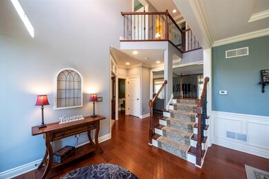 17x7 2story Foyer with hardwood floors