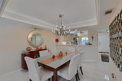 Formal dining area with coffered celing! VIRTUALLY