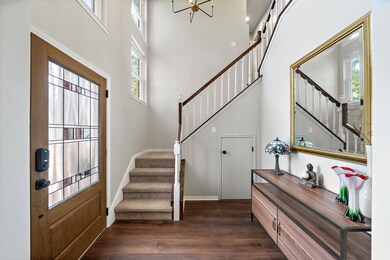 Step into a bright and inviting entryway featuring