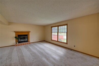 Spacious Great Room with fireplace and brand new c