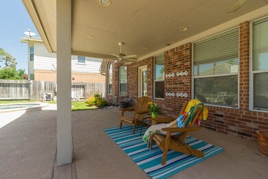 How about this back patio, with double ceiling fans.  It's big enough for launging chairs and a full size dining table.  And you still have space for your grill.