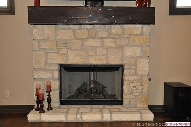 Stone Fireplace with Gas Logs (could be Wood Burni