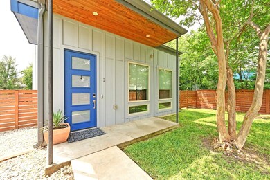 Doorway to property featuring board and batten si