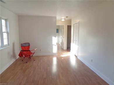 View #2 of the living room w/brand new wood and vi