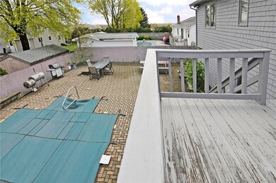 View from deck. Enclosed porch below and lots of r