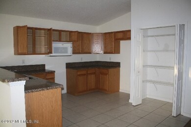 KITCHEN OPEN TO GREATROOM
