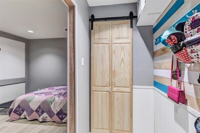 This is a cozy bedroom featuring a comfortable bed