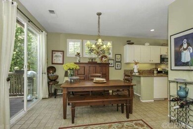 Another view of the dining room, offering access t
