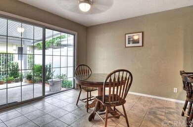 THE BREAKFAST NOOK HAS A LARGE SLIDING DOOR TO THE