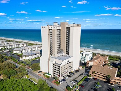 Aerial view with a beach view and a water view