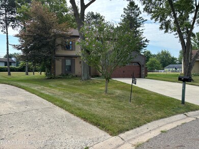 337 Honeysuckle Ln, Lansing, MI 48917 - photo 2