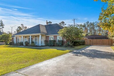 Custom built brick home, inviting front porch.