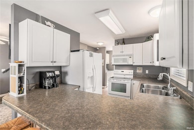 The kitchen is open to the dining room.