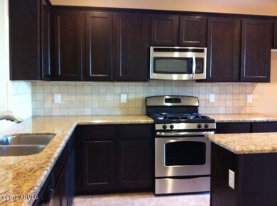 Granite countertops w/ stone backsplash