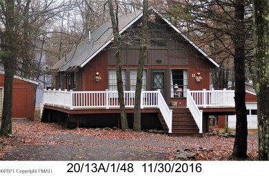 front w garage and shed 2