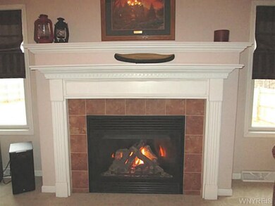 Family Room. Beautiful Gas Fireplace.  Quick as a 