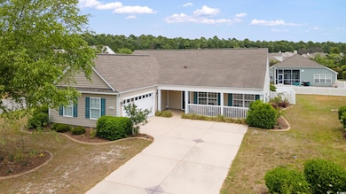 View of front of house with covered porch, concret