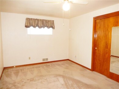 One of the 3 bedrooms in this adorable ranch.