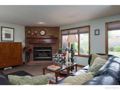 Family Room Family room opens to eat-in kitchen ar