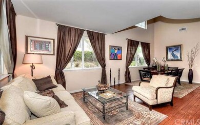 Living Room features gleaming hardwood floors, 9 f
