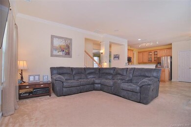 Living room with open kitchen concept with high ba