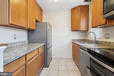 1634 W Abingdon Dr unit 102, Alexandria, VA 22314 - photo 6