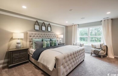 Bedroom featuring recessed lighting, baseboards, a