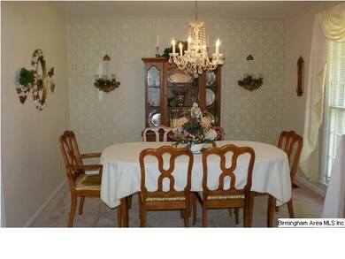 Dining room that is large enough for table and chi