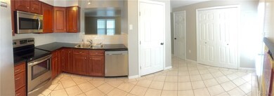 Kitchen opens to an inviting living room!