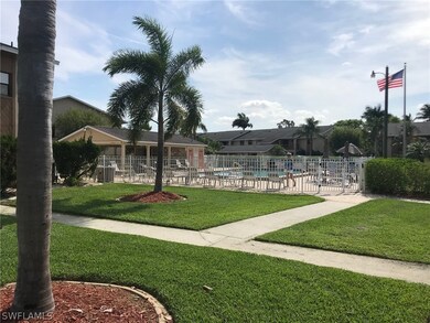 Heated Community pool features pavers.  Short walk