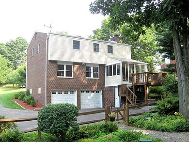 Exterior Back. Asphalt driveway to private back ya