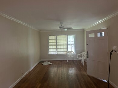 Entrance foyer featuring ornamental molding, ceili
